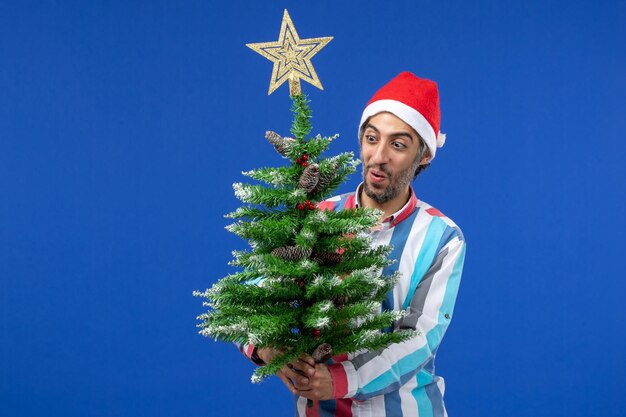 Expressive young man posing for Christmas