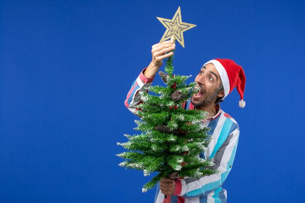 Expressive young man posing for Christmas