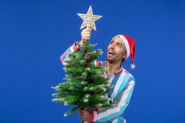 Expressive young man posing for Christmas