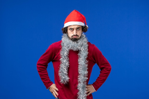 Expressive young man posing for christmas