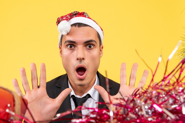 Free photo expressive young man posing for christmas