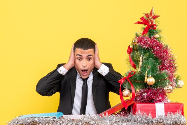 Expressive young man posing for Christmas