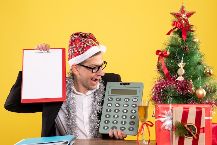 Free Photo expressive young man posing for christmas