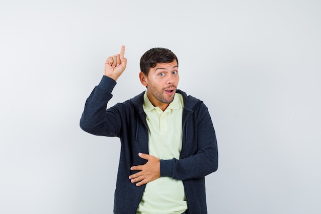 Expressive young man posing in the studio