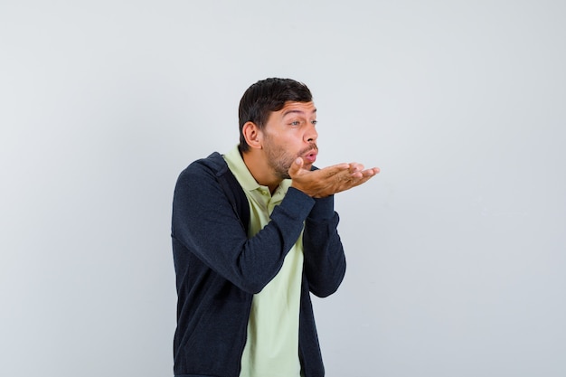 Expressive young man posing in the studio