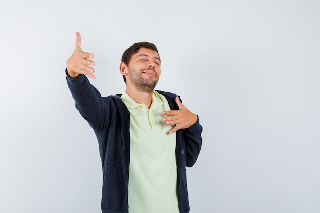 Expressive young man posing in the studio