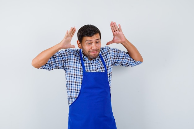 Expressive young man posing in the studio