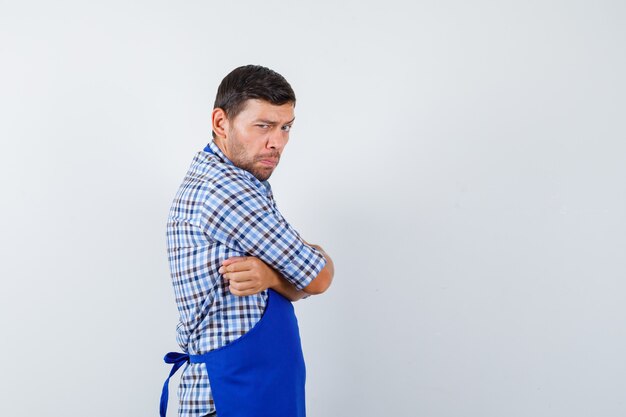 Expressive young man posing in the studio