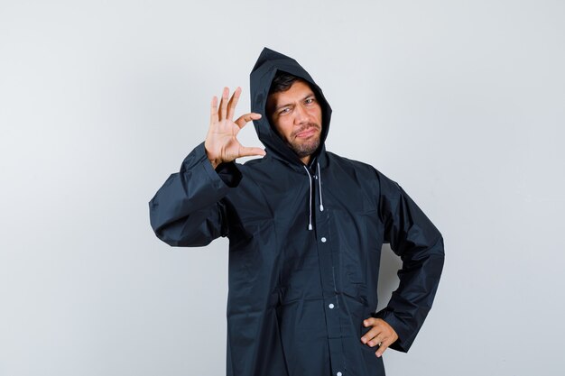 Expressive young man posing in the studio