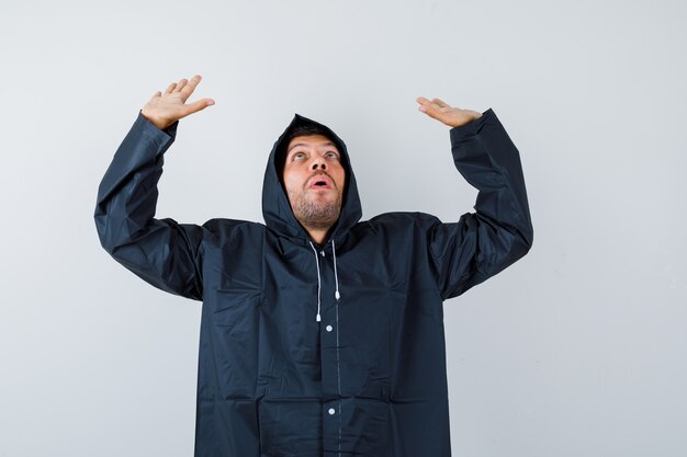 Expressive young man posing in the studio