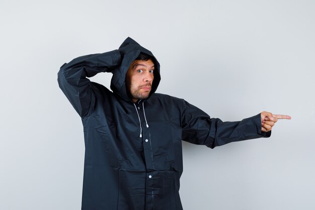 Expressive young man posing in the studio