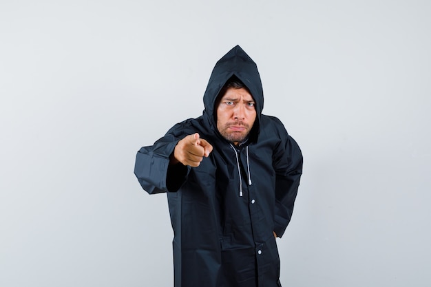 Expressive young man posing in the studio