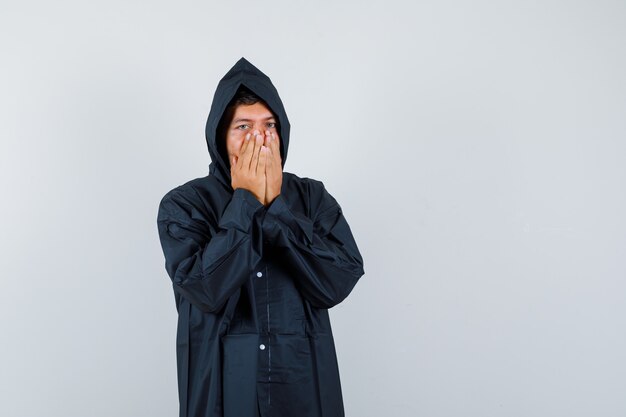 Expressive young man posing in the studio