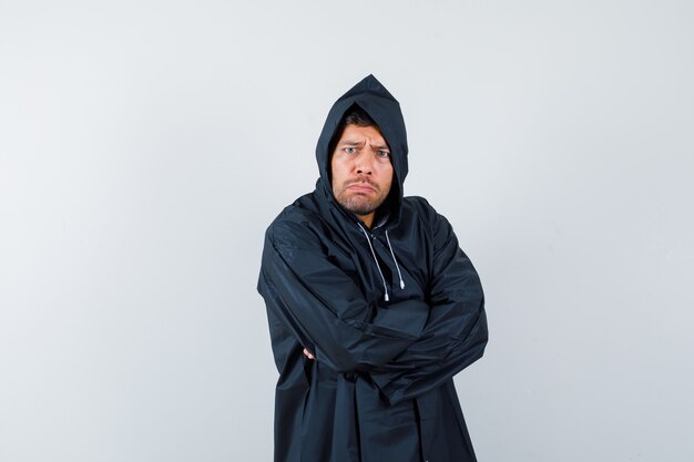 Expressive young man posing in the studio