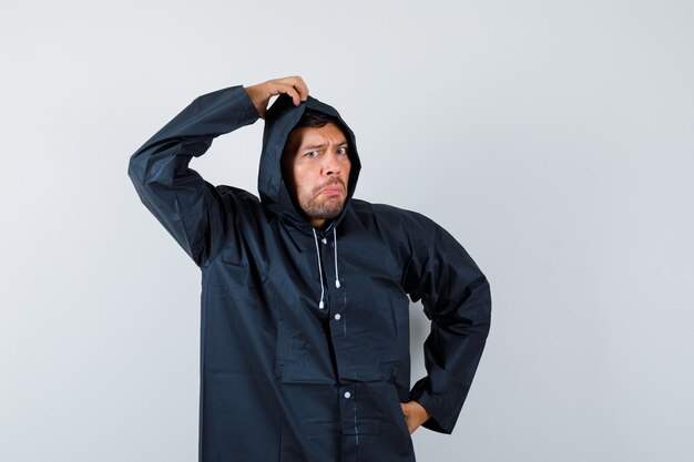 Expressive young man posing in the studio