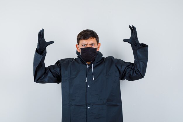 Expressive young man posing in the studio