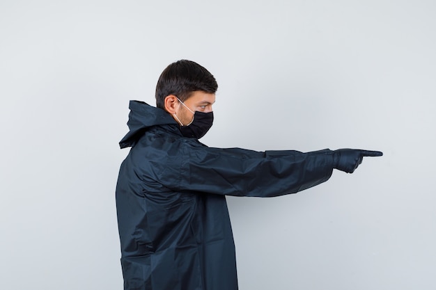 Expressive young man posing in the studio