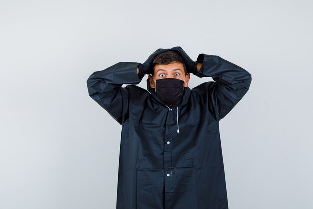 Expressive young man posing in the studio