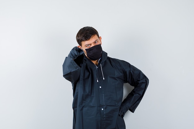 Expressive young man posing in the studio