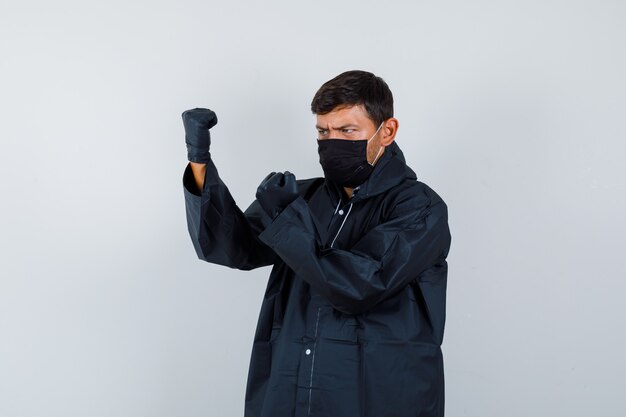 Expressive young man posing in the studio