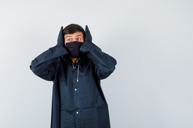 Expressive young man posing in the studio