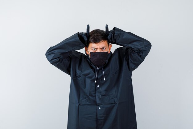 Expressive young man posing in the studio