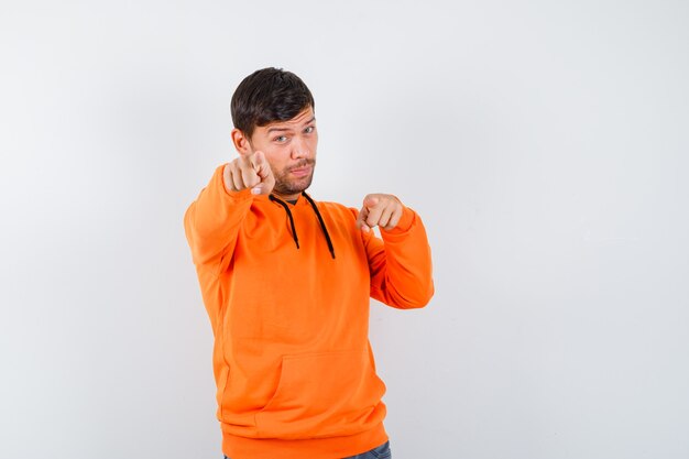 Expressive young man posing in the studio