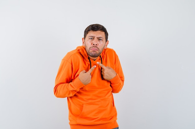 Expressive young man posing in the studio