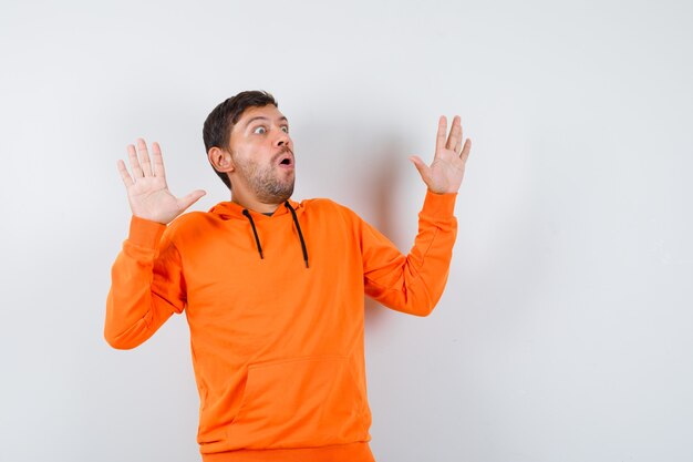 Expressive young man posing in the studio