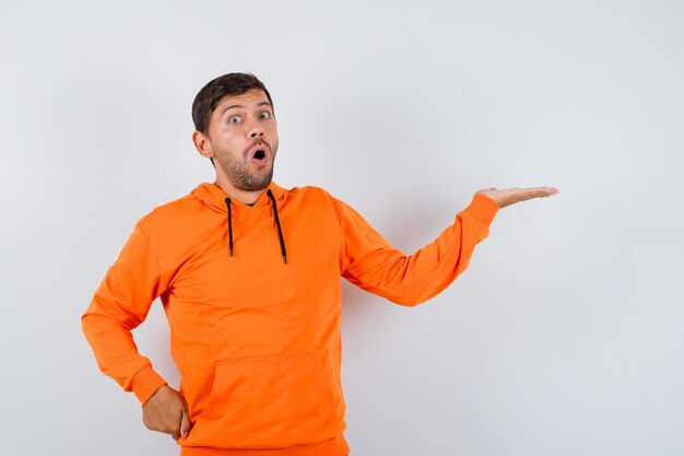 Expressive young man posing in the studio