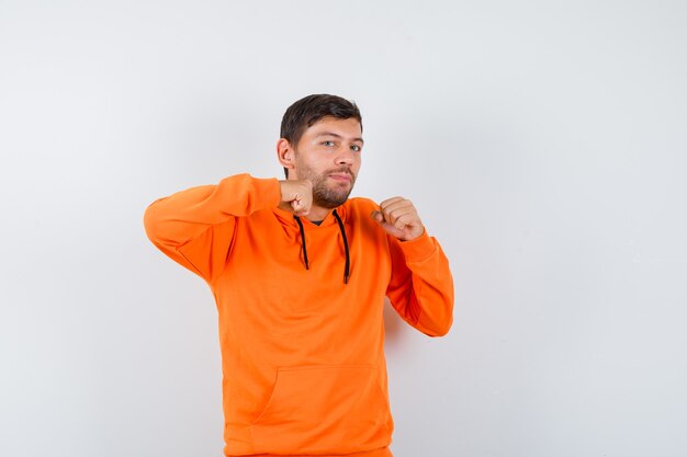 Expressive young man posing in the studio