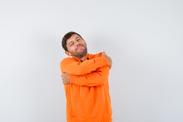 Free photo expressive young man posing in the studio