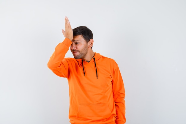 Expressive young man posing in the studio