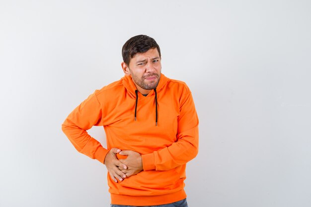 Expressive young man posing in the studio