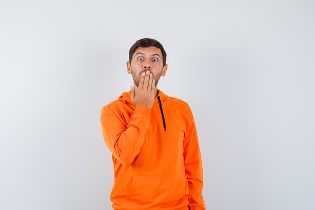 Expressive young man posing in the studio