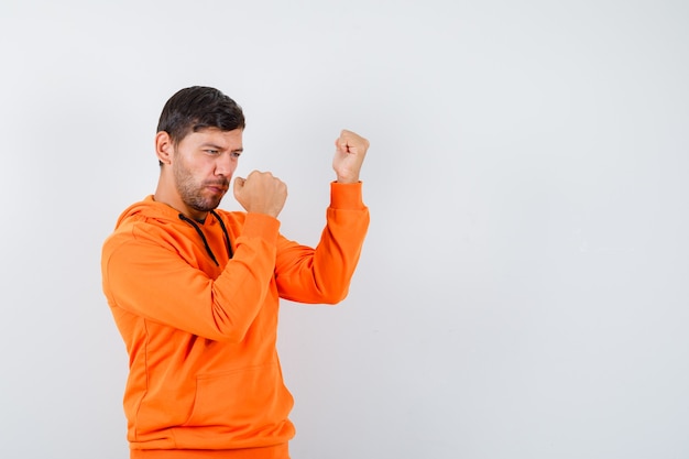 Expressive young man posing in the studio