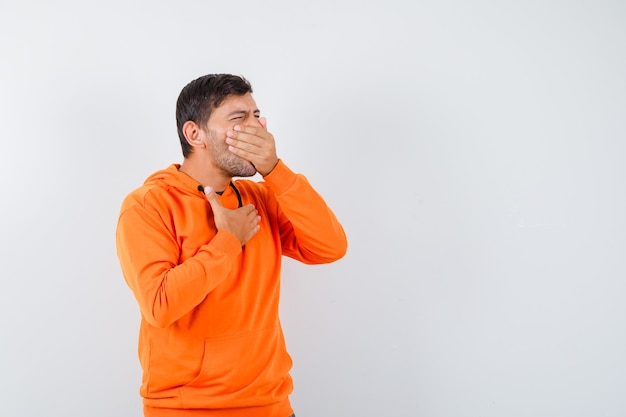 Expressive young man posing in the studio