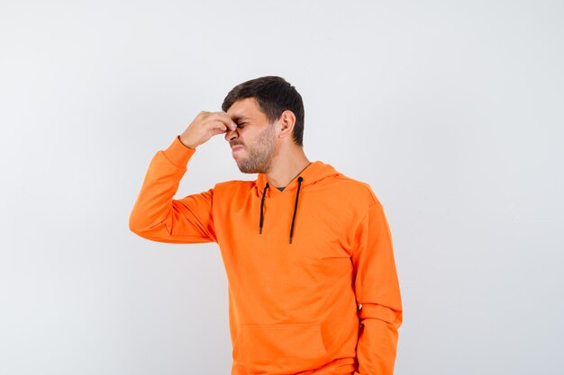 Expressive young man posing in the studio