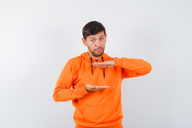 Expressive young man posing in the studio