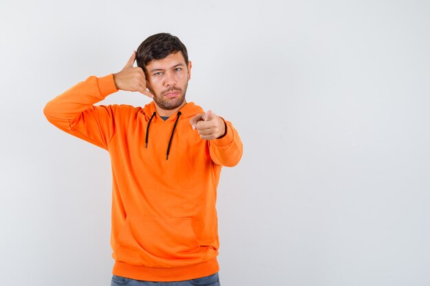 Expressive young man posing in the studio