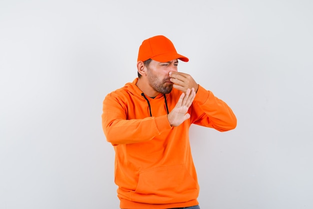 Expressive young man posing in the studio