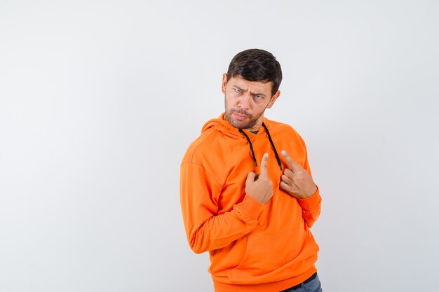 Expressive young man posing in the studio