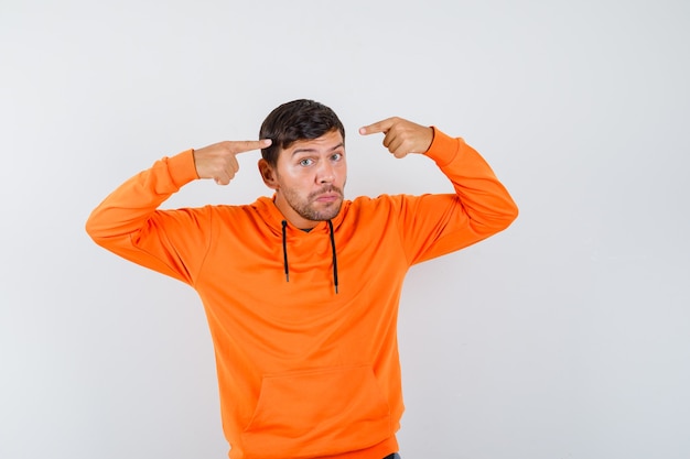 Expressive young man posing in the studio