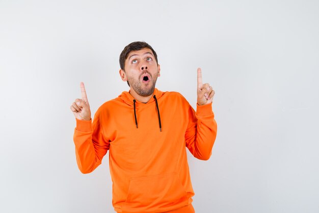 Expressive young man posing in the studio