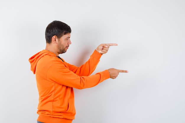 Expressive young man posing in the studio