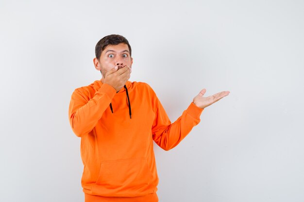 Expressive young man posing in the studio