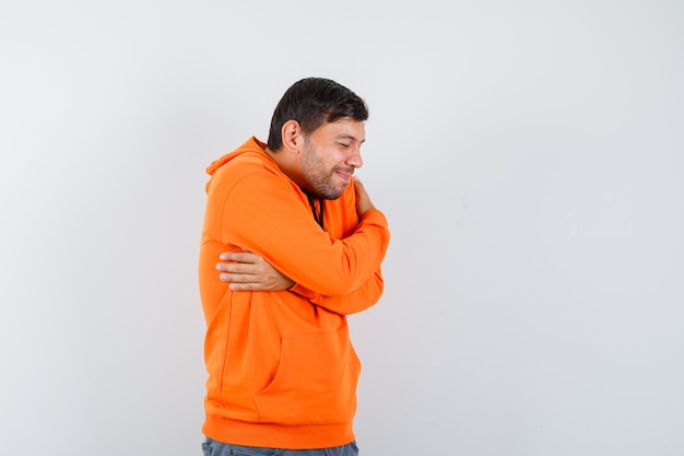 Expressive young man posing in the studio