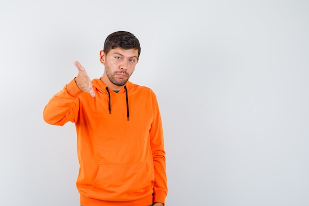 Expressive young man posing in the studio