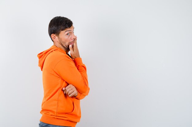 Expressive young man posing in the studio