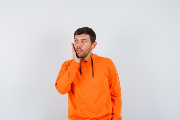 Expressive young man posing in the studio